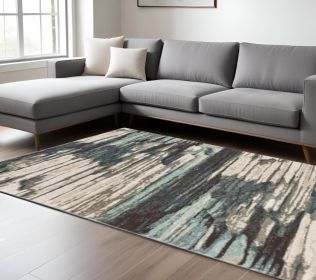 6' X 9' Ivory Blue And Gray Abstract Area Rug