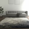 5' X 7' Gray And Ivory Abstract Area Rug
