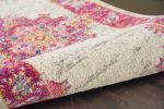 7' X 10' Ivory And Fuchsia Oriental Distressed Area Rug