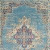 5' X 7' Blue And Ivory Southwestern Distressed Area Rug