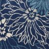 5' X 7' Blue And Ivory Floral Area Rug