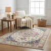 5' X 7' Pink And Ivory Southwestern Distressed Area Rug