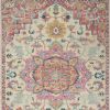 7' X 10' Pink And Ivory Southwestern Distressed Area Rug