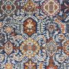 5' X 7' Blue And Ivory Oriental Area Rug