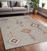 5' X 7' Gray Blue And Orange Tribal Area Rug