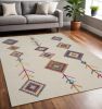 5' X 7' Blue Ivory And Pink Geometric Area Rug