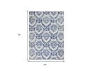 4' X 6' Ivory And Blue Damask Distressed Area Rug
