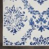 5' X 7' Ivory And Blue Damask Distressed Area Rug