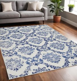 5' X 7' Ivory And Blue Damask Distressed Area Rug