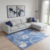6' X 9' Blue And Ivory Floral Distressed Area Rug
