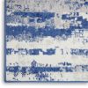 4' X 6' Ivory And Blue Ombre Distressed Area Rug