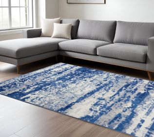 6' X 9' Ivory And Blue Ombre Distressed Area Rug