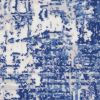 5' X 7' Blue And Ivory Abstract Distressed Area Rug