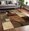 5' X 8' Brown And Black Abstract Geometric Area Rug