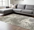 7' X 10' Gray And Ivory Distressed Abstract Area Rug