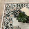8' X 10' Ivory Orange And Gray Geometric Distressed Area Rug