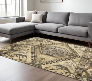 8' X 11' Tan And Gold Medallion Area Rug