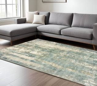 6' X 9' Blue And Gray Abstract Hand Loomed Distressed Area Rug