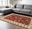 6' X 9' Red And Ivory Oriental Area Rug
