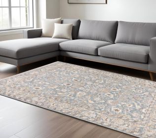 7' X 10' Blue And Ivory Oriental Distressed Area Rug