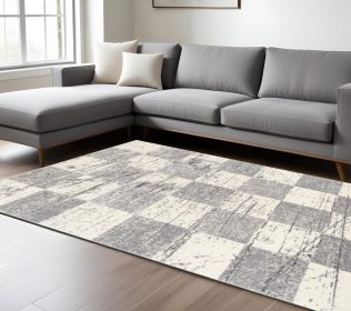 7' X 9' Gray and White Checkered Power Loom Distressed Area Rug