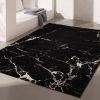 7' X 9' Black And White Abstract Area Rug