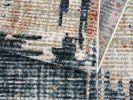 7' X 9' Blue And Ivory Abstract Area Rug