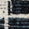 7' X 9' Blue And Ivory Abstract Area Rug