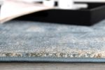 8' X 11' Cream And Blue Abstract Patches Area Rug