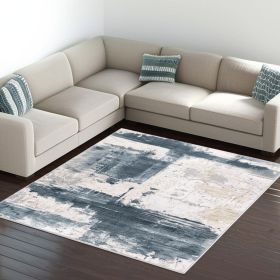 9' X 12' Cream And Blue Abstract Patches Area Rug