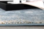 9' X 12' Cream And Blue Abstract Patches Area Rug