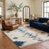 9' X 13' Blue And Ivory Southwestern Shag Area Rug