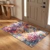 2' X 4' Blue and Ivory Abstract Area Rug