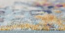 2' X 4' Blue and Ivory Abstract Area Rug