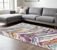 6' X 9' Ivory Blue and Gold Abstract Area Rug