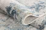 4' X 6' Blue and Ivory Abstract Power Loom Area Rug