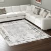 7' X 10' Gray and Ivory Abstract Power Loom Area Rug