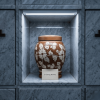 Floral pottery urns for ashes